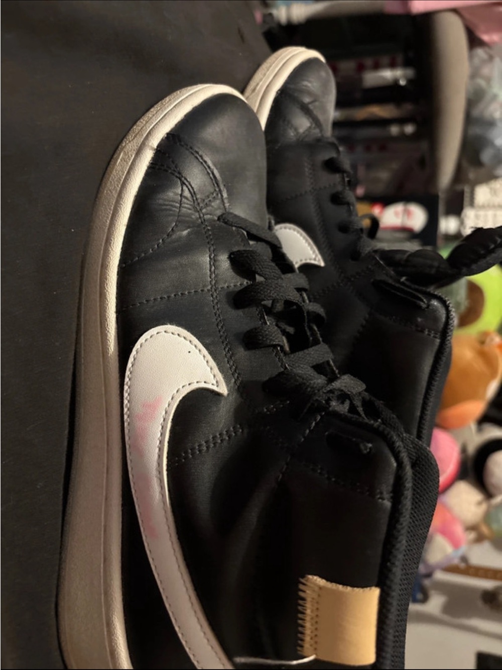 Nike women Black High-Top Sneakers with White Swoosh